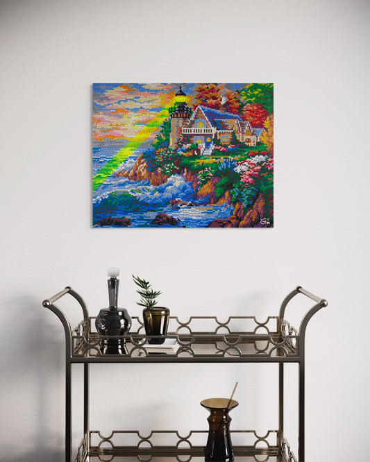 A vibrant pixel art canvas of a lighthouse with a green laser beam, displayed in a modern interior. The artwork showcases a scenic coastal landscape with a colorful sky and ocean waves.