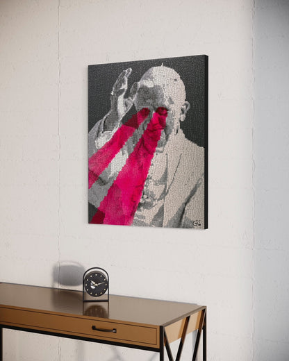 A pixel art canvas of the Pope with glowing red laser eyes, rendered in grayscale. The artwork is displayed in a contemporary room, adding bold visual contrast to the minimalist decor.
